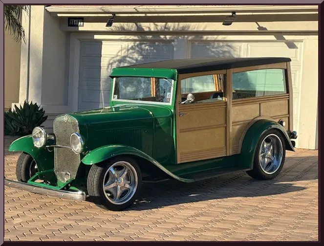 Vintage green car with wooden panels