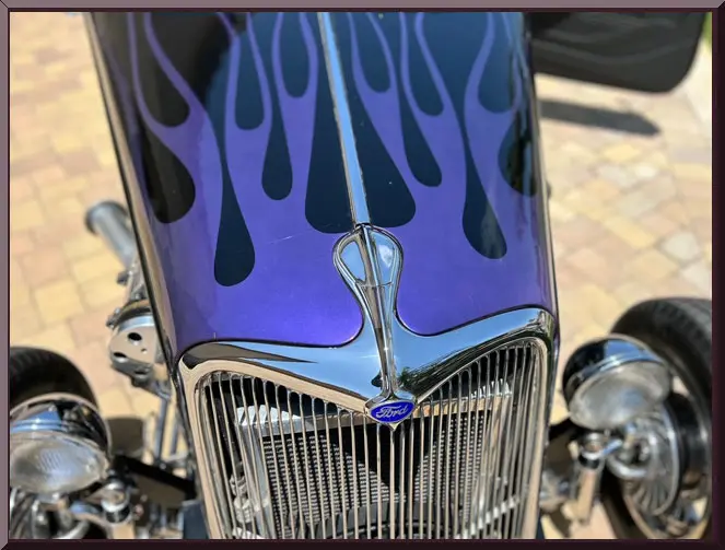 Vintage car hood with flame pattern
