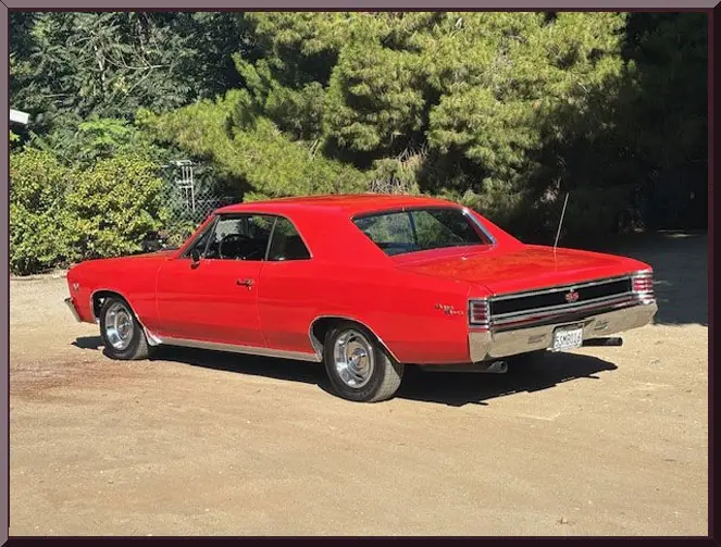 Classic red car in sunlight