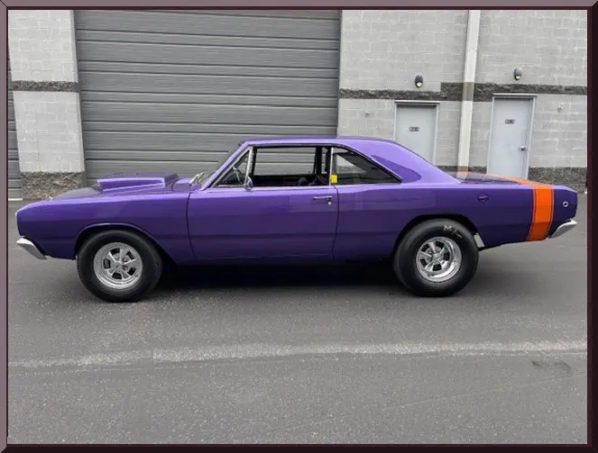 Side view of purple muscle car