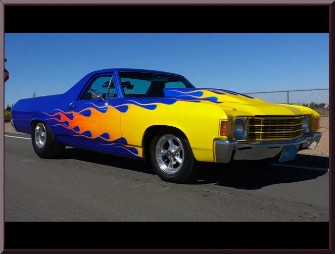 Vintage car with colorful flame design