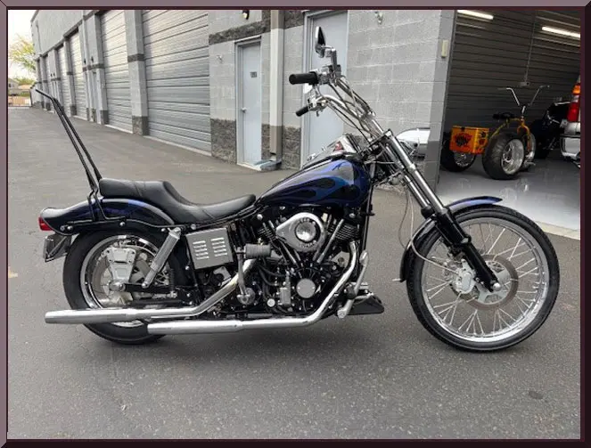 Vintage-style motorcycle with sissy bar