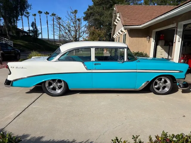 Side profile of turquoise and white Bel Air
