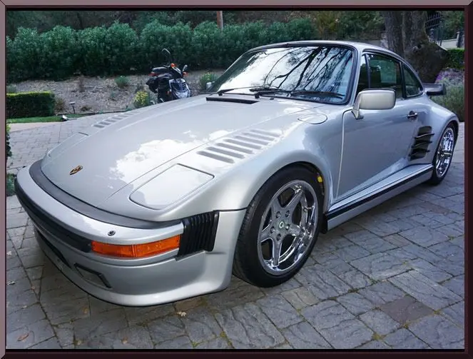 Vintage Porsche with shiny chrome wheels