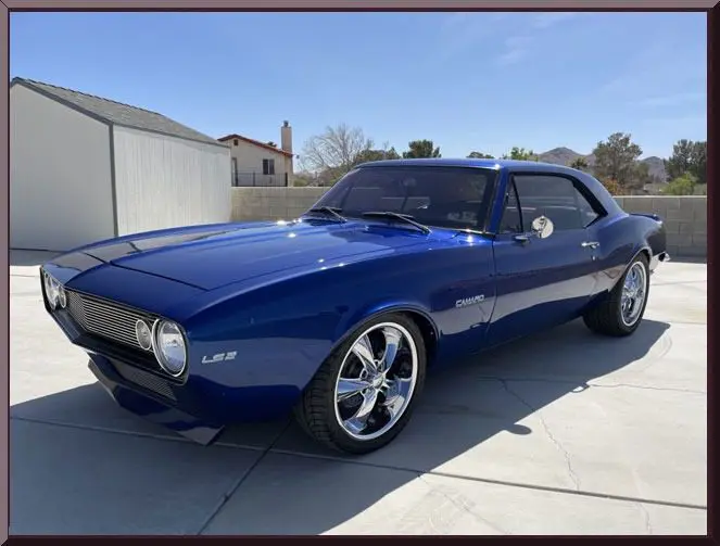 Shiny blue classic car outdoors