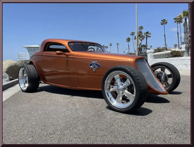 Classic custom car with palm trees