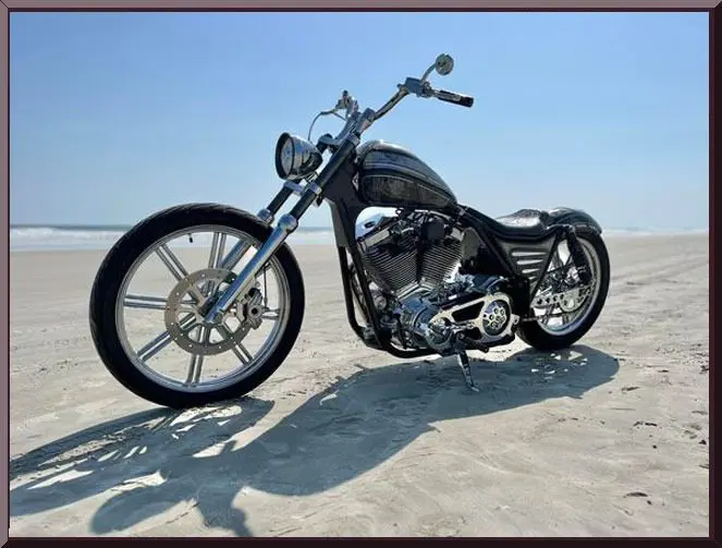 Chopper parked by the ocean