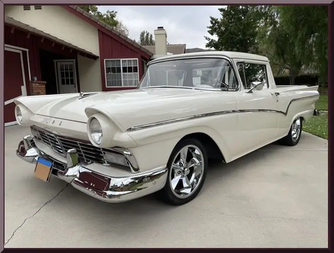 Classic white vintage car parked outdoors