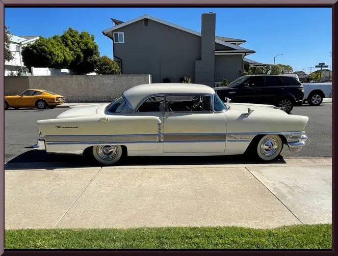 Vintage car in suburban neighborhood