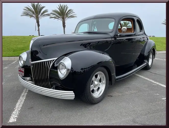 Classic car with palm trees