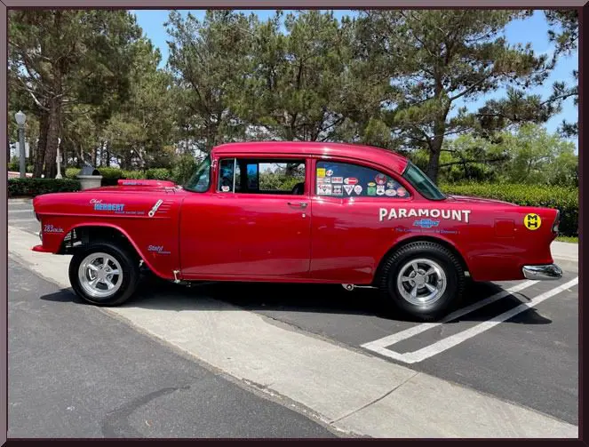 Red classic hot rod with Paramount decals