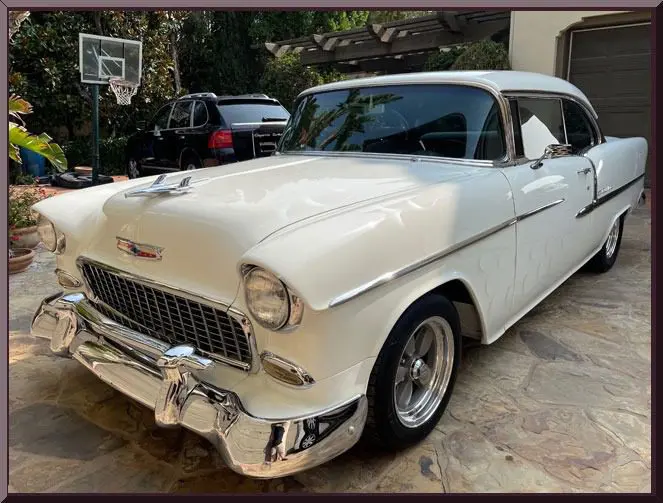 Retro white car parked outdoors