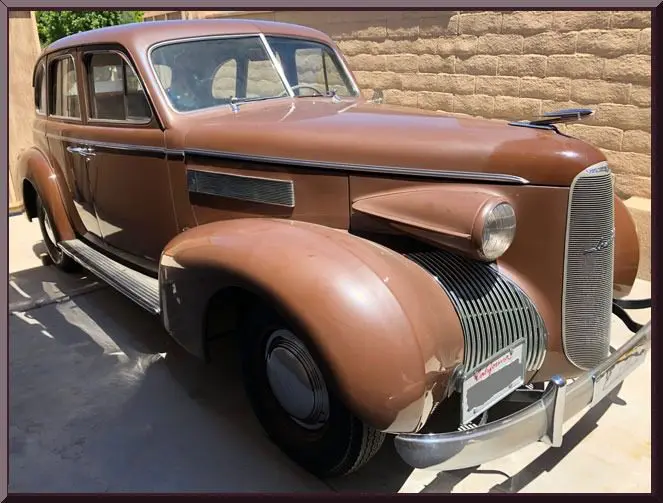 Retro car with round headlights