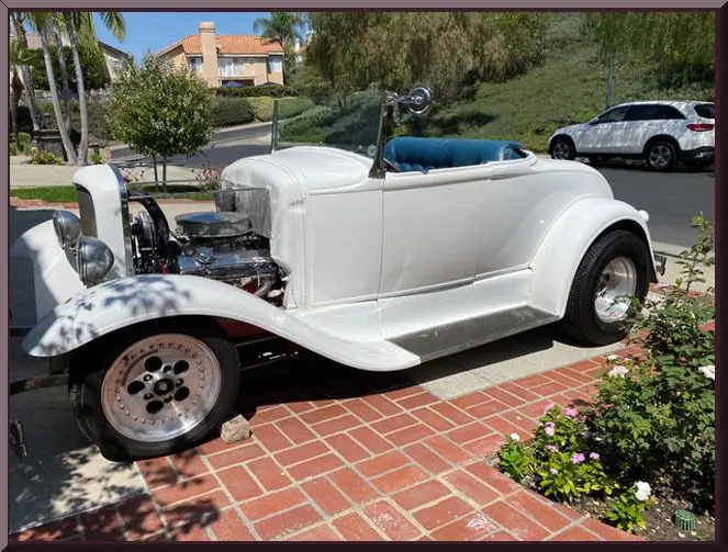 Retro convertible on brick driveway