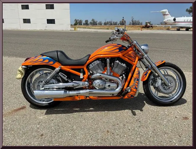 Orange motorcycle with flame design