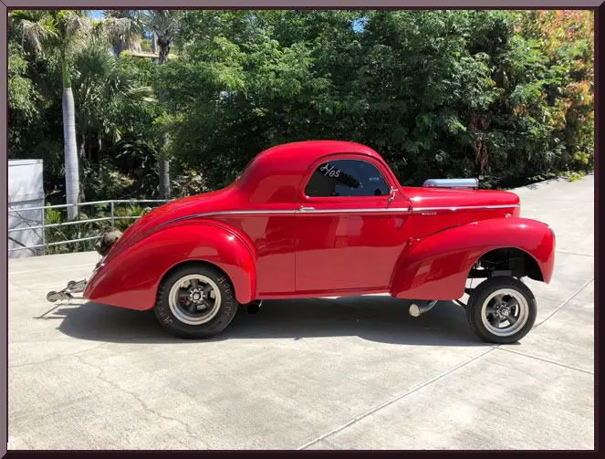 Glossy red vintage gasser hot rod