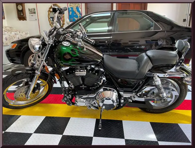 Shiny black motorcycle indoors