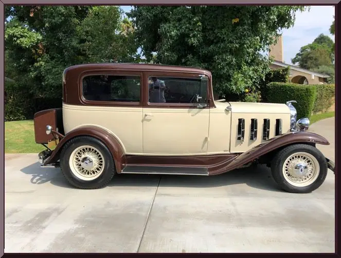 Vintage car parked on driveway