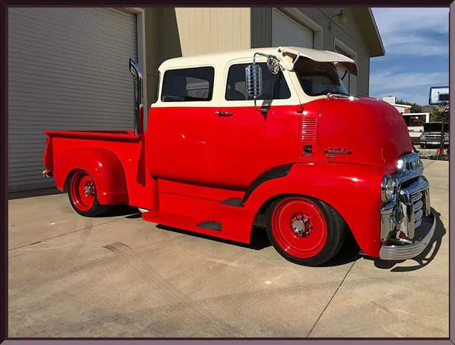 Classic red truck with white roof