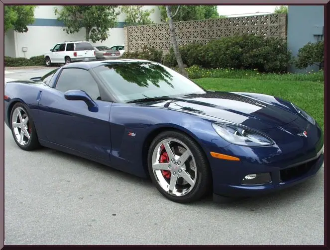 Sleek blue car with chrome wheels