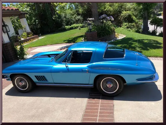 Classic car in suburban setting