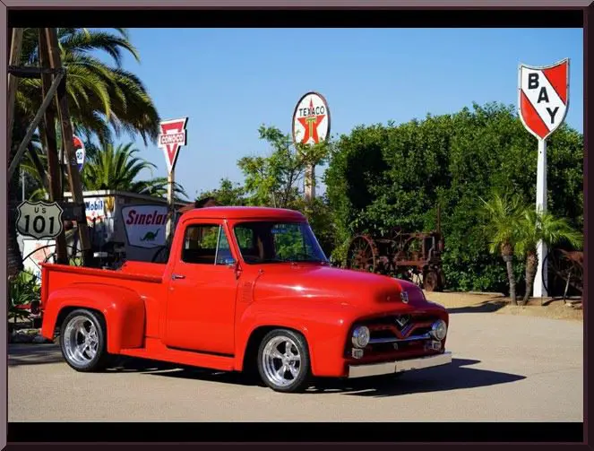 Red vintage truck in sunny setting