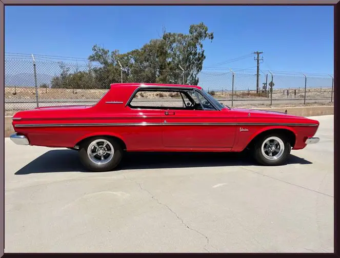 Classic red car with black stripes