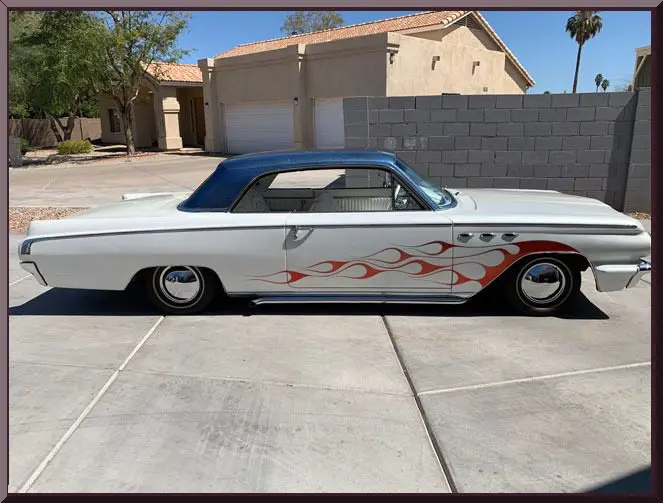 Classic car with flame decals