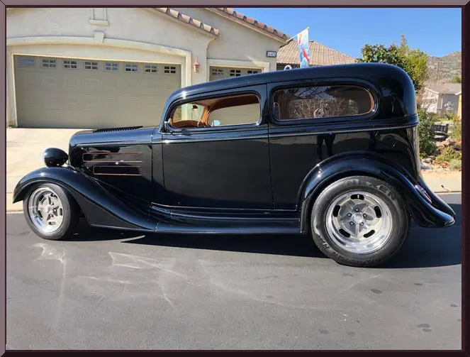 Classic car with shiny chrome wheels