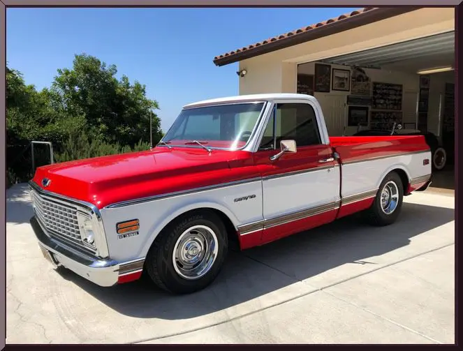 Vintage red and white pickup truck