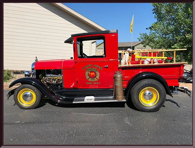 Retro firefighting vehicle on sunny day