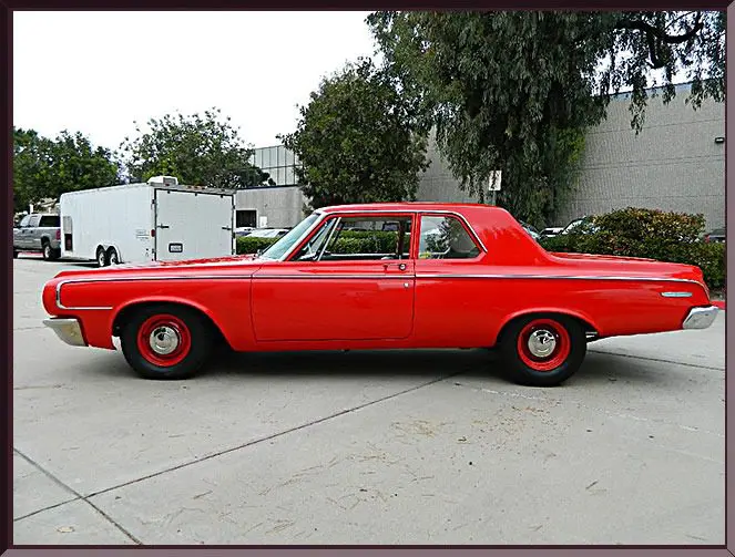 Red vintage car parked outdoors