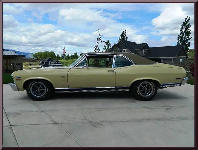 Retro automobile on driveway
