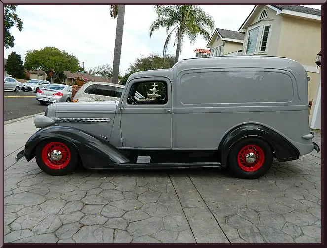 Retro delivery van on concrete driveway