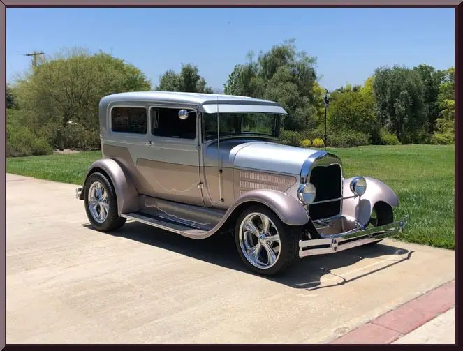 Vintage classic car parked on driveway