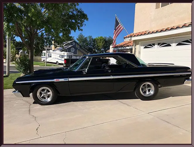 Classic car with American flag background
