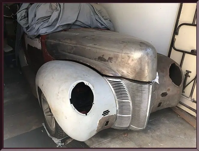Old car frame in garage