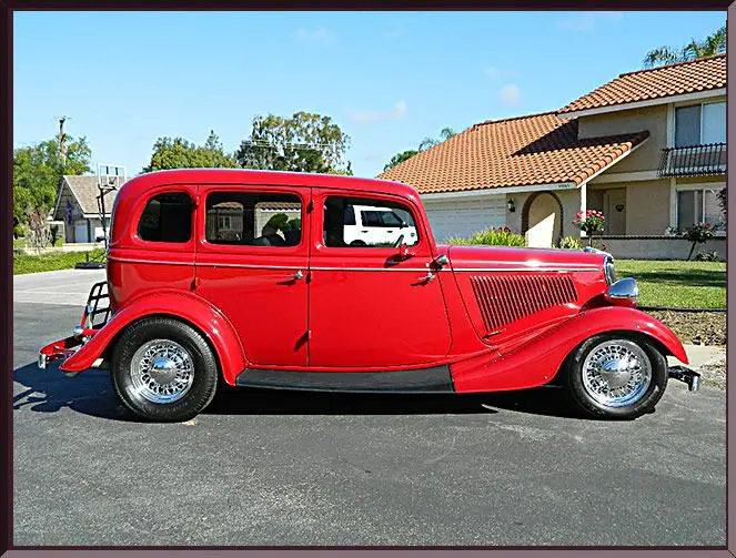 Retro automobile with shiny chrome wheels