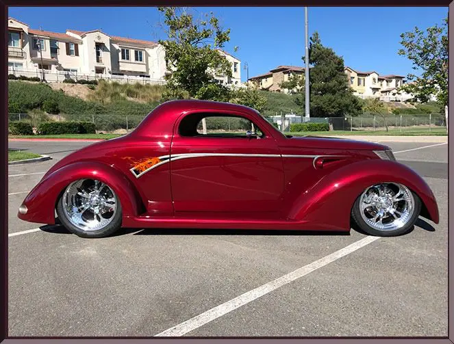 Sleek retro car under clear sky