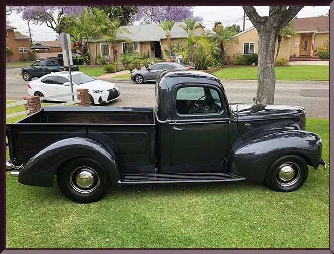 Classic pickup parked in neighborhood