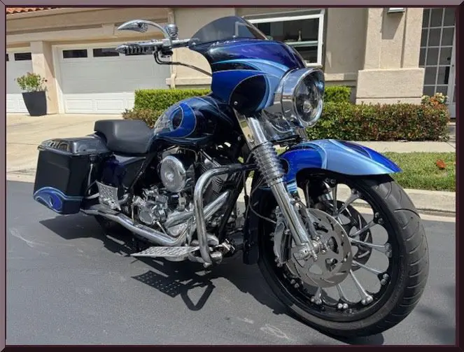 Shiny blue bike with chrome details