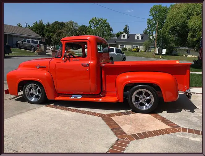 Retro pickup truck in suburban neighborhood