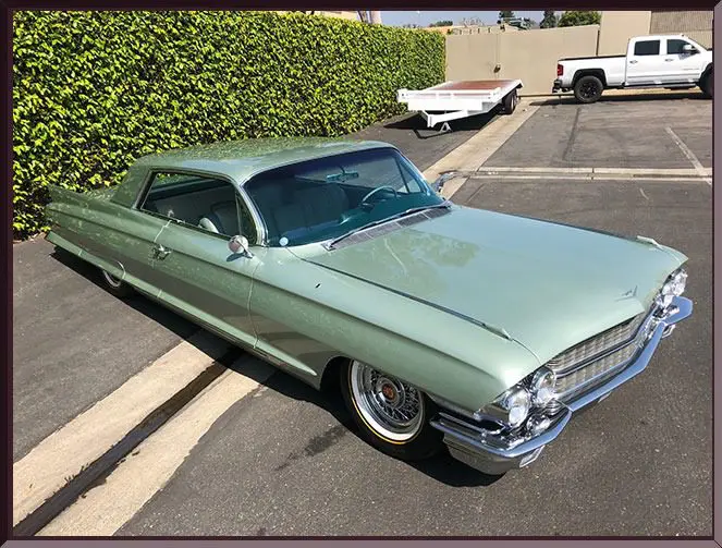 Classic car parked on sunny day