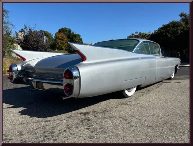 Classic car with prominent tail fins