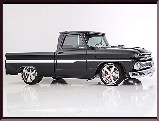 Sleek black retro pickup side view