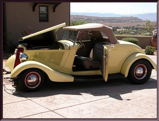 Vintage convertible car with open doors