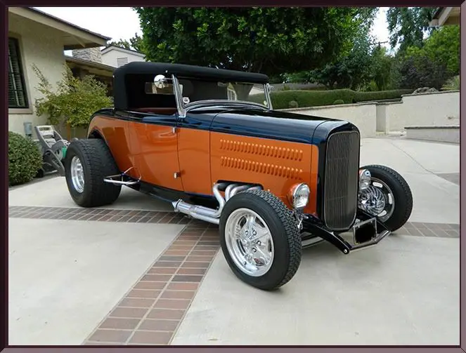 Orange and black vintage hot rod