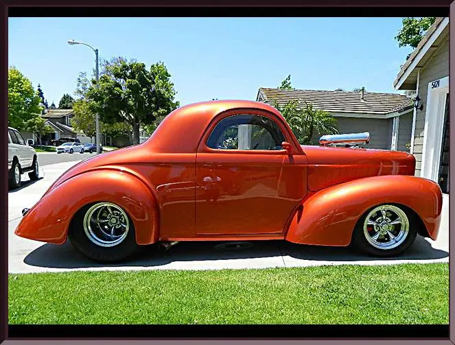 Vintage hot rod in suburban setting