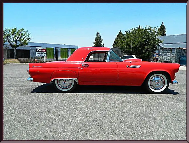 Red vintage car on sunny day
