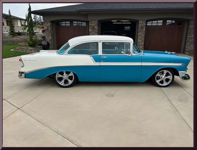 Retro two-tone car parked outside